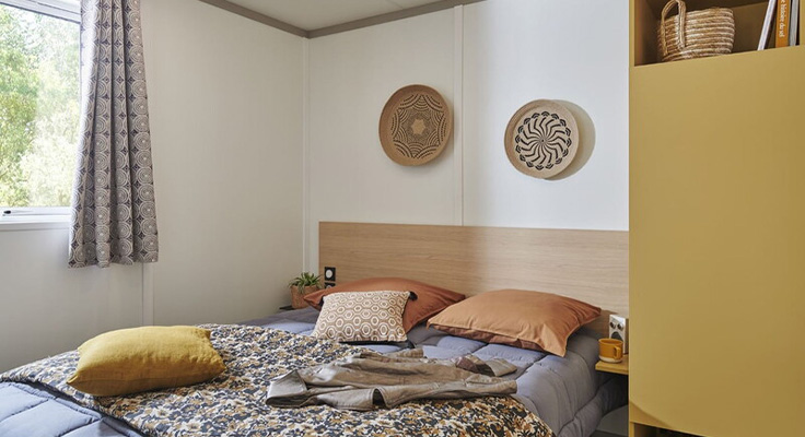 Chambre d'un chalet Classic au camping Le Cormoran