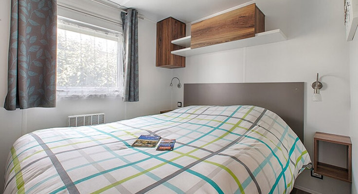 Chambre d'un mobil-home Premium au camping Le Cormoran